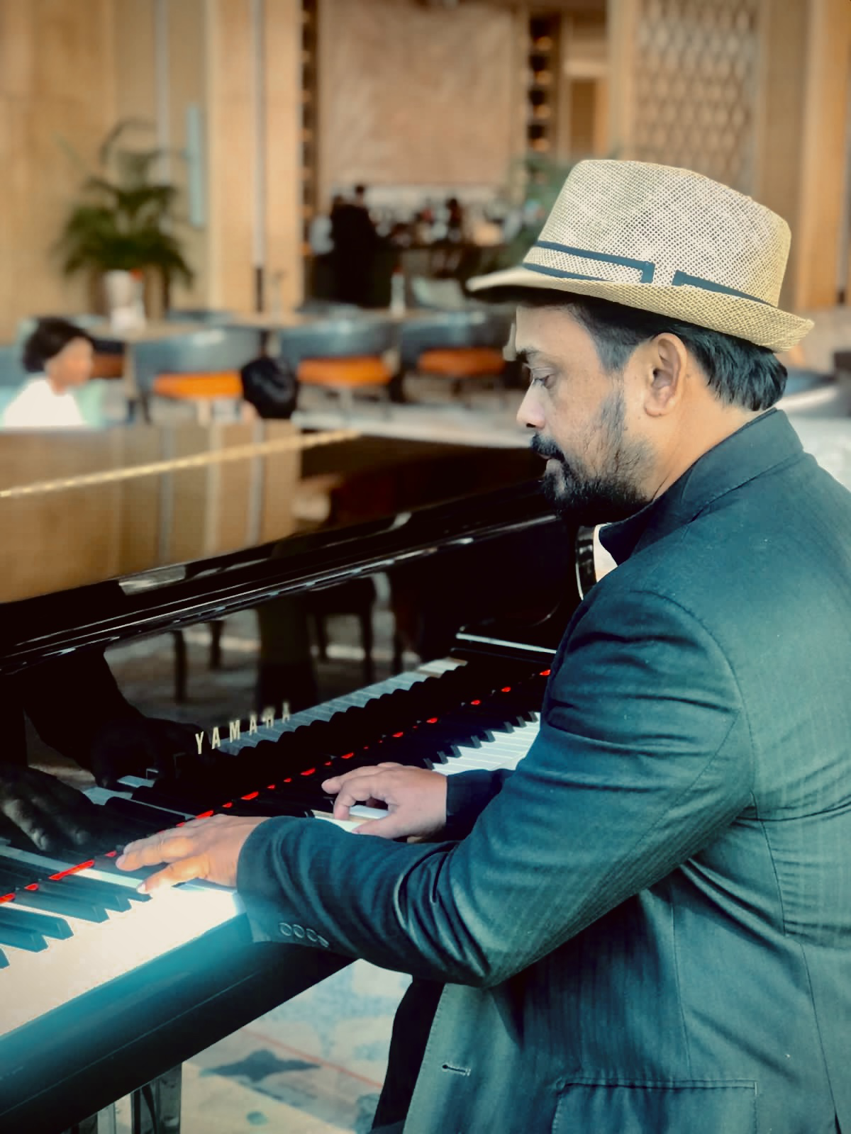 Founder performing at piano